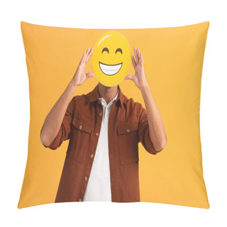 Personality  KYIV, UKRAINE - SEPTEMBER 24, 2019: Man Covering Face With Happy Emoticon Isolated On Orange  Pillow Covers
