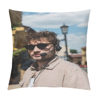 Personality  Portrait Of Young Tour Guide In Sunglasses And Headset Looking At Camera On Blurred Andrews Descent In Kyiv Pillow Covers