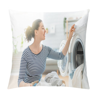 Personality  Beautiful Young Woman Is Smiling While Doing Laundry At Home. Pillow Covers