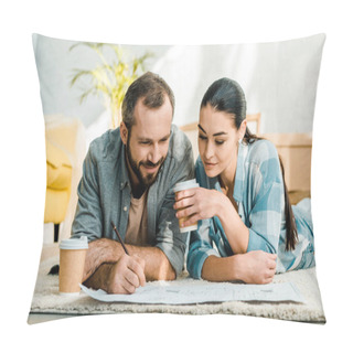 Personality  Husband And Beautiful Wife Lying On Floor, Drinking Coffee And Working On Blueprint Of New House At Home, Moving Concept Pillow Covers