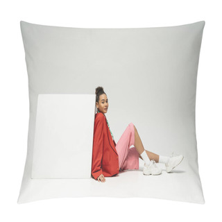 Personality  Pretty African American Woman In Vibrant Outfit Sitting Near Cube On Grey Backdrop, Look At Camera Pillow Covers