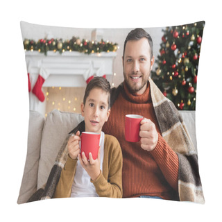 Personality  Happy Dad And Son With Cups Of Cocoa Sitting Under Warm Blanket In Living Room With Blurred Christmas Decor Pillow Covers