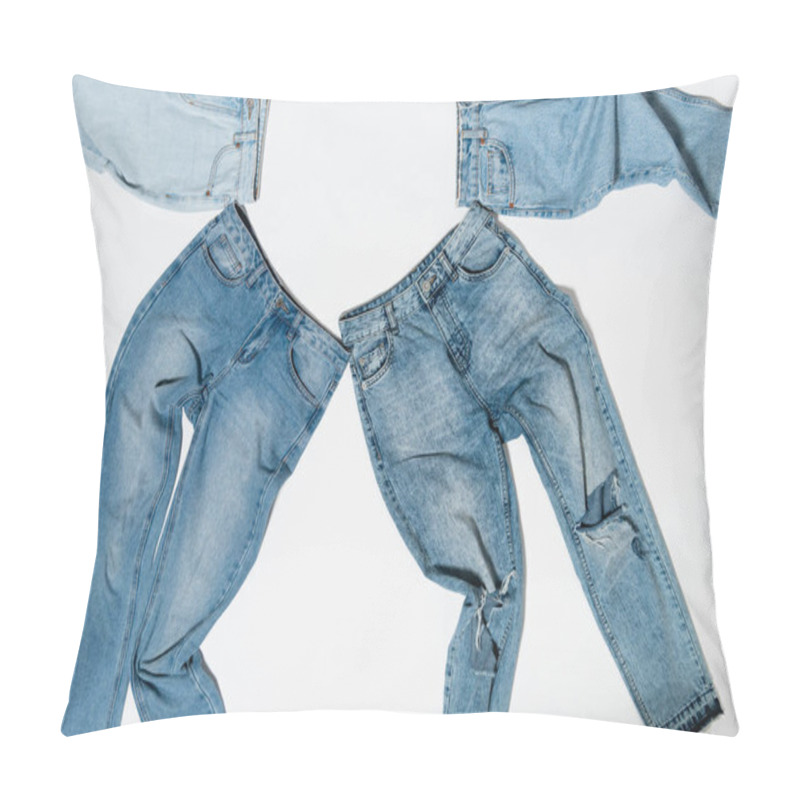 Personality  Top View Of Various Denim Jeans On White Background Pillow Covers