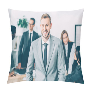 Personality  Handsome Young Manager Looking At Camera With Blurred Multicultural Businesspeople In Conference Hall Pillow Covers