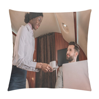 Personality  Smiling African American Stewardess Giving Cup Of Coffee To Handsome Businessman Working On Laptop In Private Jet Pillow Covers