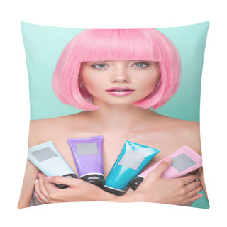 Personality  Attractive Young Woman With Pink Bob Cut Holding Various Tubes Of Coloring Hair Tonics Looking At Camera Isolated On Turquoise Pillow Covers