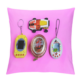 Personality  Saint-Petersburg, Russia - March 27, 2019: Old Retro Game Tamagotchi Virtual Pet Toy  And Yo Yo Toy With Label Coca-cola On Pink  Background, Car In 80s Style, Toys From 90s. Illustrative Editorial Pillow Covers