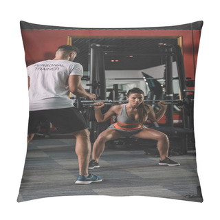 Personality  Back View Of Personal Trainer Looking At Young Sportswoman Lifting Barbell Pillow Covers