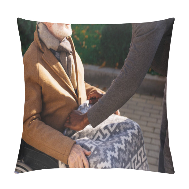 Personality  Cropped Shot Of African American Man Covering Senior Disabled Man In Wheelchair With Plaid On Street Pillow Covers
