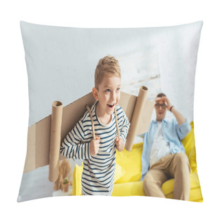 Personality  Selective Focus Of Happy Boy With Carton Plane Wings On Back Imitating Flying Near Father  Pillow Covers