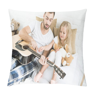 Personality  High Angle View Of Father And Cute Little Daughter With Teddy Bear Looking At Acoustic Guitar On Bed  Pillow Covers