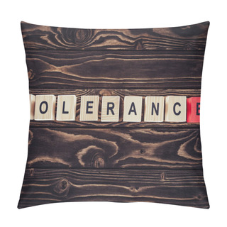 Personality  Flat Lay With Arranged Wooden Blocks In Tolerance Word On Brown Wooden Surface Pillow Covers