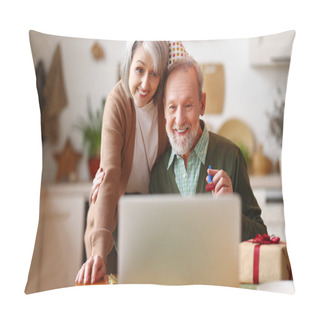 Personality  Positive Elderly Couple Husband And Wife In Party Hats Waving At Webcam On Laptop, Receiving Birthday Congratulations From Family Via Video Call While Sitting In Kitchen At Table With Gift Box Pillow Covers