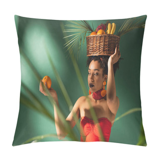 Personality  Young African American Woman Holding Orange And Basket With Exotic Fruits On Head Behind Blurred Palm Leaves On Green Pillow Covers
