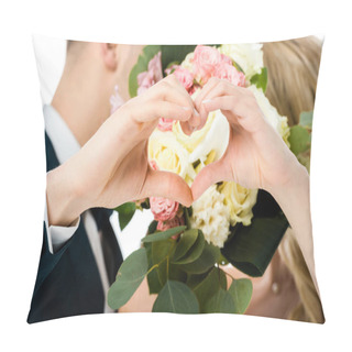 Personality  Selective Focus Of Groom And Bride Showing Heart Sign With Hands, While Hiding Faces Behind Wedding Bouquet Isolated On White Pillow Covers
