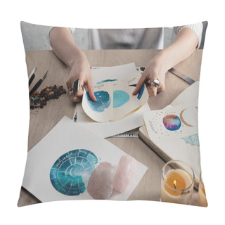 Personality  Cropped View Of Astrologer Holding Watercolor Paintings With Zodiac Signs On Cards By Candles And Crystals On Table  Pillow Covers