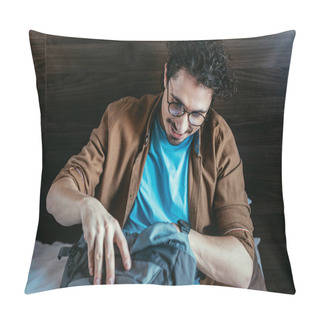 Personality  Smiling Male Tourist Taking Something From Backpack In Hotel Room Pillow Covers