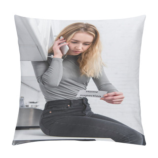 Personality  Beautiful Young Woman Holding Card With Lettering Home Inspection And Talking On Smartphone In Kitchen  Pillow Covers