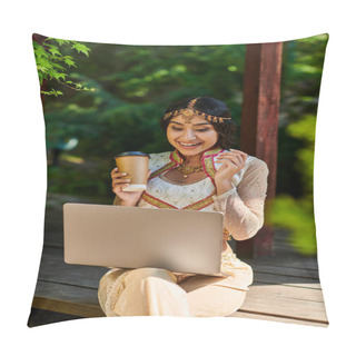 Personality  Cheerful Indian Woman With Coffee To Go Looking At Laptop In Wooden Alcove In Park On Summer Day Pillow Covers