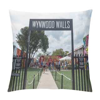 Personality  MIAMI, USA - MARCH 19, 2016: Wynwood Wall Entrance With People. The Wynwood Art District Association Was Founded In Early 2003 By A Group Of Art Dealers, Artists And Curators. Pillow Covers