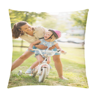 Personality  Laughing Mother Holding Daughter On Bike In A Sunny City Park Pillow Covers