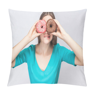 Personality  Young Crazy Woman In Blue Blouse Biting One Lip And Making Glasses While Covering Eyes With Donuts On Grey Background Pillow Covers