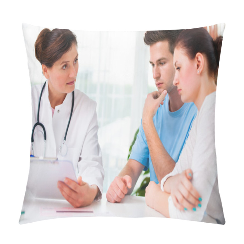 Personality  Doctor consults a young couple pillow covers