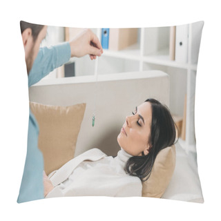 Personality  Cropped Shot Of Bearded Hypnotist Hypnotising Young Woman With Closed Eyes Lying On Couch Pillow Covers