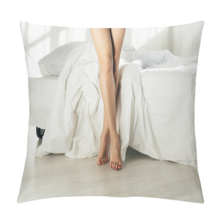 Personality  Cropped View Of Woman Standing With Crossed Legs Near Bed Pillow Covers