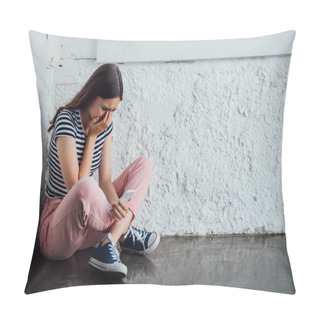 Personality  Sad Crying Girl In Pink Pants Sitting Near Wall And Holding Smartphone Pillow Covers