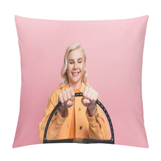 Personality  Positive Blonde Driver Looking At Steering Wheel Isolated On Pink  Pillow Covers