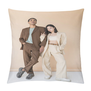 Personality  Full Length Of Multiethnic Couple In Trendy Pantsuits Posing With Hands In Pockets On Beige Background Pillow Covers
