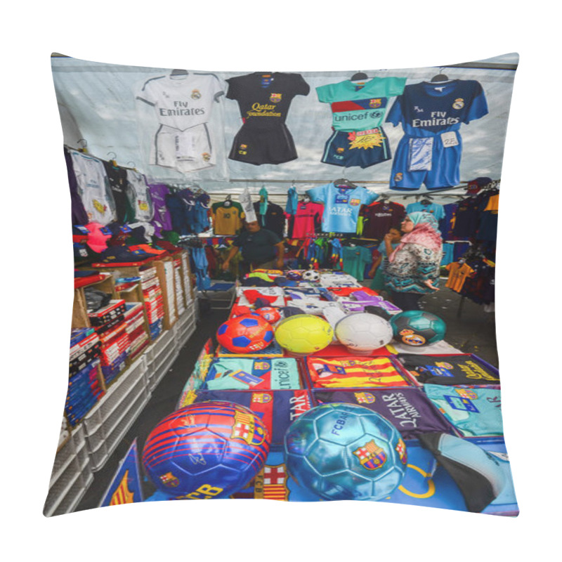 Personality  Street market outlet on Rambla Nova in Tarragona selling football merchandise including Barcelona football club jerseys pillow covers