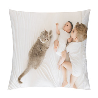 Personality  Overhead View Of Cute Little Brothers In White Bodysuits And Grey Cat Lying On Bed Together At Home Pillow Covers