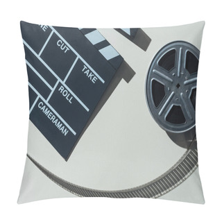 Personality  Top View Of Clapperboard And Film Reel With Cinema Tape On Grey Background Pillow Covers