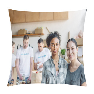 Personality  Selective Focus Of Multicultural Women Looking At Camera While Standing Near Volunteers In Charity Center Pillow Covers