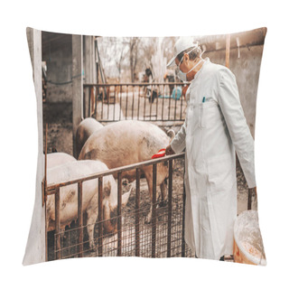 Personality  Veterinarian In White Coat And Mask On The Face Feeding Pigs. Pigs Breeding Concept. Pillow Covers