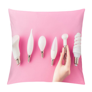 Personality  Cropped Shot Of Human Hand And Various Types Of Light Bulbs On Pink  Pillow Covers