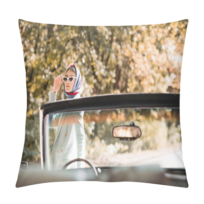 Personality  Stylish woman in sunglasses standing near cabriolet car on blurred foreground outdoors  pillow covers