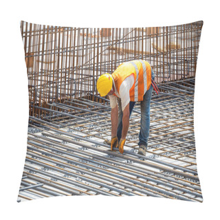 Personality  Construction Worker Installing Floor Slab Reinforcement Bars At The Construction Site. Pillow Covers