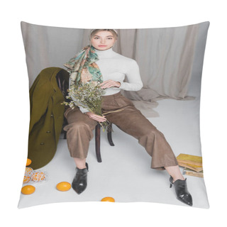 Personality  Full Length Of Stylish Woman With Flowers Near Vintage Books And Oranges On Grey Draped Background Pillow Covers