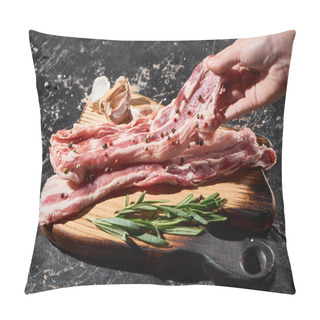 Personality  Cropped View Of Raw Pork Slice In Hand Near Rosemary And Garlic On Black Marble Surface Pillow Covers