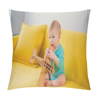 Personality  Infant Boy Sitting On Couch And Playing With Wooden Biplane Pillow Covers