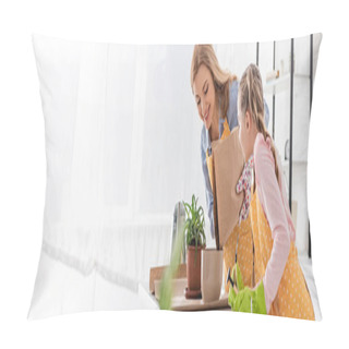 Personality  Horizontal Image Of Happy Mother With Paper Bag Putting Ground To Flowerpot And Cute Daughter With Rake Near Table In Kitchen Pillow Covers
