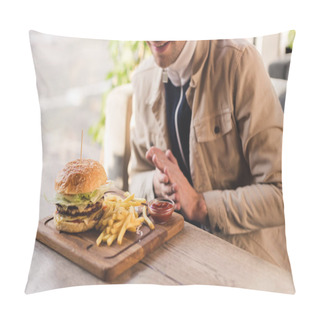 Personality  Cropped View Of Cheerful Man Looking At Tasty Burger And French Fries On Cutting Board In Cafe Pillow Covers