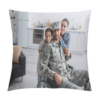 Personality  Man In Military Uniform And Wheelchair Looking At Camera Near Family At Home  Pillow Covers