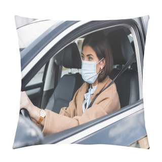 Personality  Young Woman In Medical Mask Looking Ahead While Driving Car On Blurred Foreground Pillow Covers