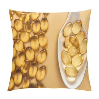 Personality  Top View Of Golden Shiny Fish Oil Capsules In Spoon On Yellow Background Pillow Covers