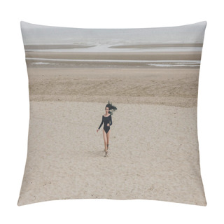 Personality  Attractive Young Woman In Black Bodysuit Running On Sandy Seashore Pillow Covers