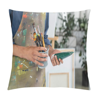 Personality  Cropped View Of African American Artist In Apron Holding Paintbrushes And Paint Tube Pillow Covers